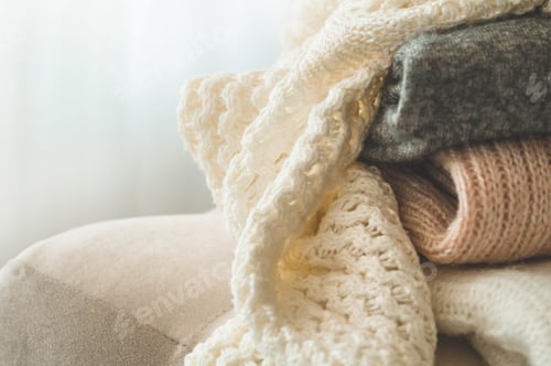 Preview: Folded Knitted Textiles in Cream, Grey, and Pink