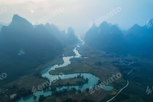 Preview: Beautiful foggy mountain on rural village and winding river at Phong Nam Valley
