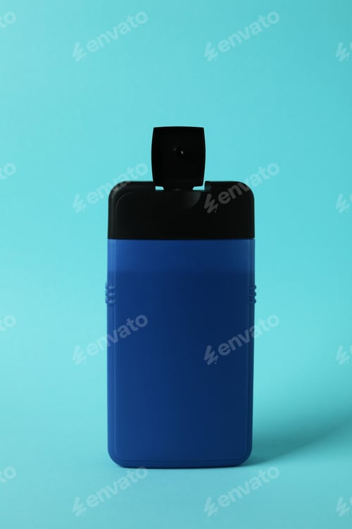 Preview: Blank bottle of shower gel on blue background