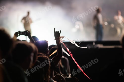 Preview: crowd partying stage lights live concert summer music festival