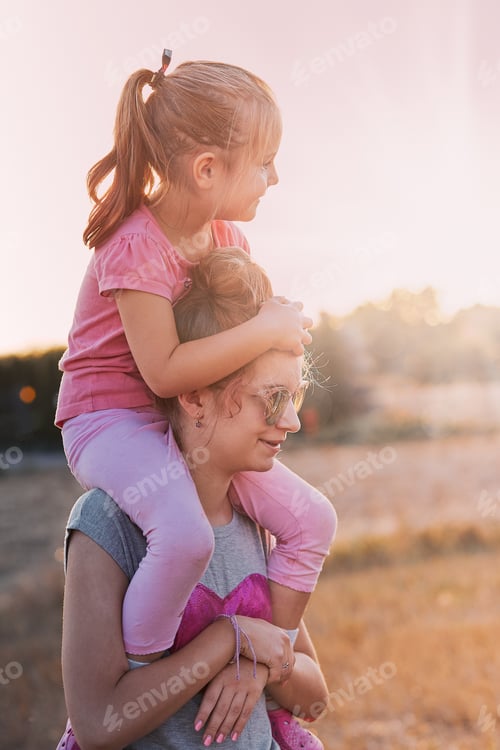 Preview: Sisters enjoying piggyback ride