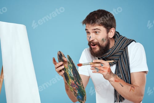Preview: Male artist palette brush easel art hobby blue background