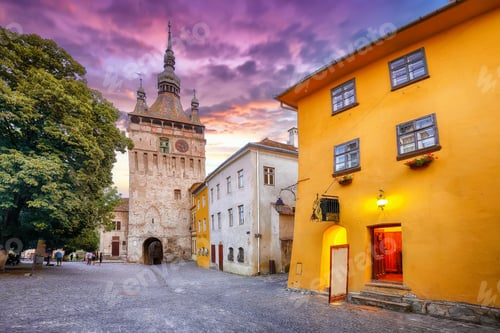 Preview: Amazing evening view of historic town Sighisoara and Clock Tower built by Saxons.