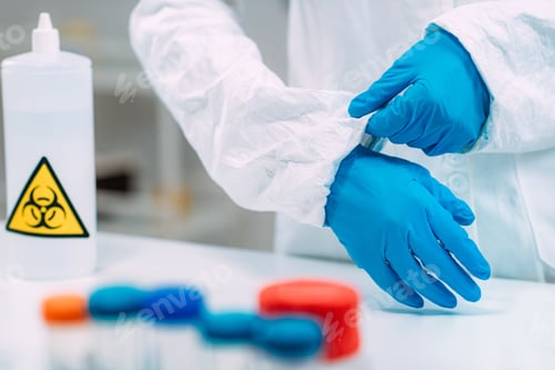 Preview: Scientist Preparing in Laboratory With Safety Equipment