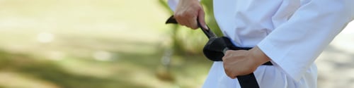 Preview: Taekwondo Athlete Tying Belt