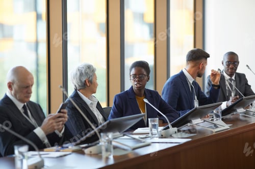 Preview: Business partners at seminar