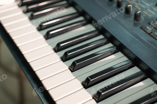 Preview: Electronic musical keyboard synthesizer close-up view. piano for recording music