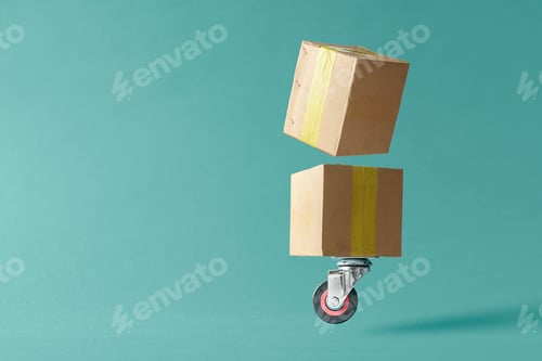 Preview: Cardboard boxes on a wheel from a shopping cart.