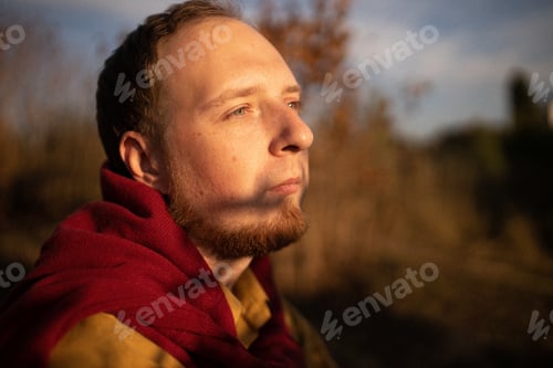 Preview: Autumn photo shoot of a guy in the field. Red-haired guy. Millennium. Youth and joy.