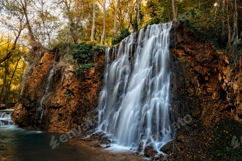 Preview: Scenic waterfall cascading down rocks in Monasterio de Piedra, Spain