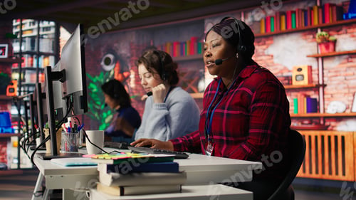 Preview: Call center agent in noisy office asking coworker to lower voice