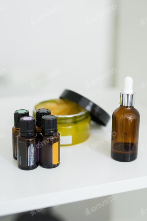 Preview: Close up of body care cosmetic products on shelf in cosmetology. Spa and piling cosmetics