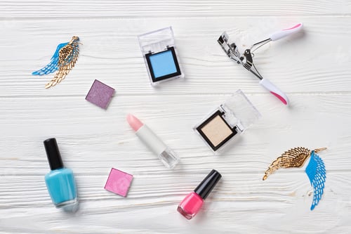 Preview: Set of decorative cosmetics, wooden background.