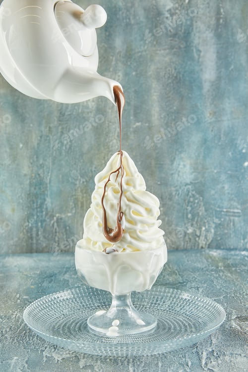 Preview: Liquid chocolate paint drizzled over whipped cream like a feather painting
