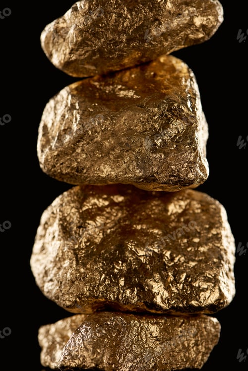 Preview: close up of gold textured shiny stones isolated on black