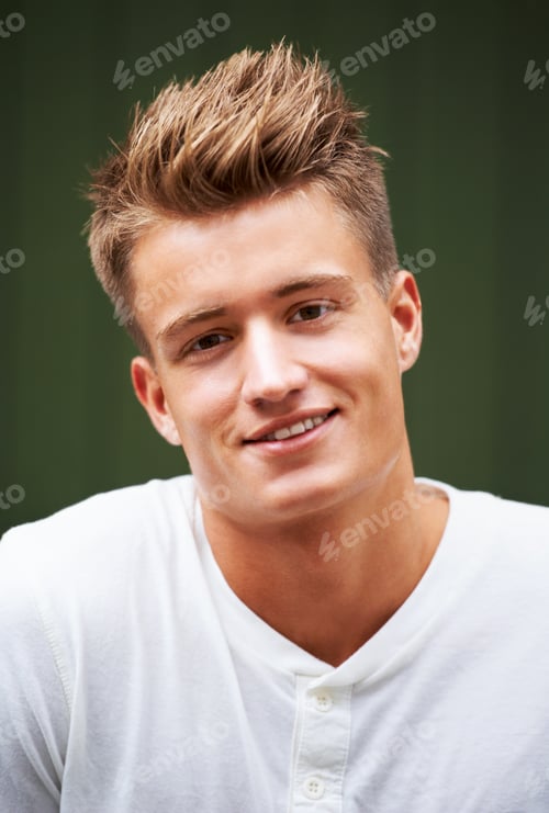 Preview: Happiness is a journey not a destination. Portrait of a handsome young man standing outside.