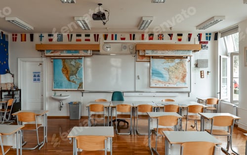 Preview: Empty school classroom with white board on wall.