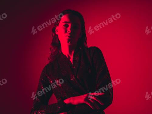 Preview: Young fashion woman posing in studio
