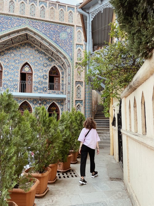 Preview: A girl walking near sulfur baths in Tbilisi Georgia.Architecture of Tbilisi.Travelling and tourism