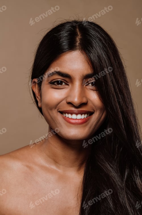 Preview: Professional beauty studio portrait on a young indian woman with long dark hair