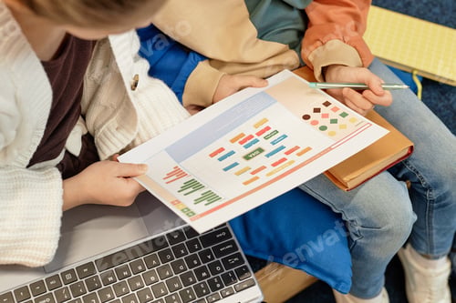 Preview: Two Children Looking at Diagram at School