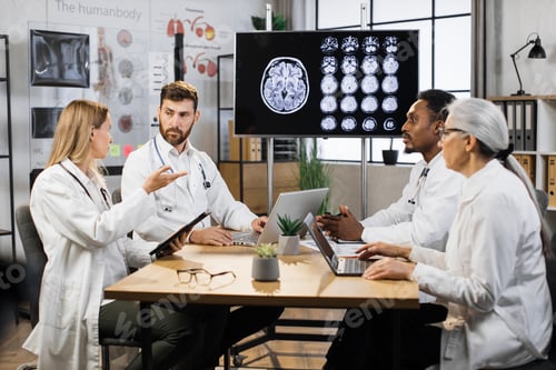 Preview: Medical team having meeting in conference room in hospital