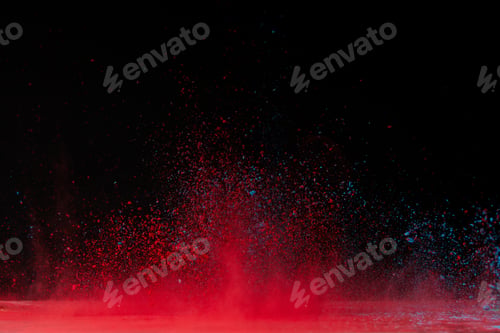 Preview: red holi powder explosion on black, traditional festival of colours