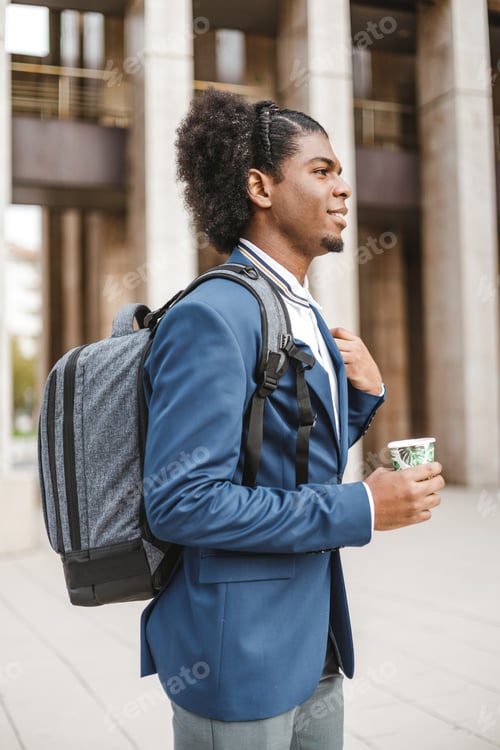 Preview: young african american businessman, vertical side view
