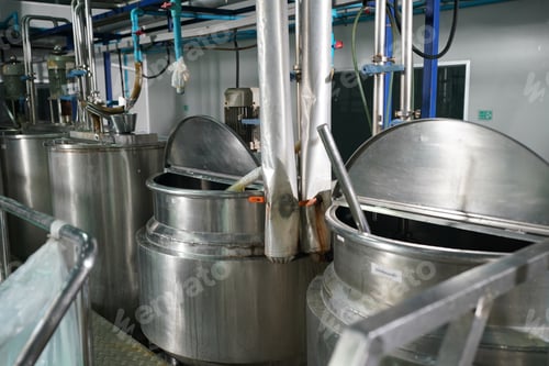 Preview: Metal reservoirs at a soft drink factory