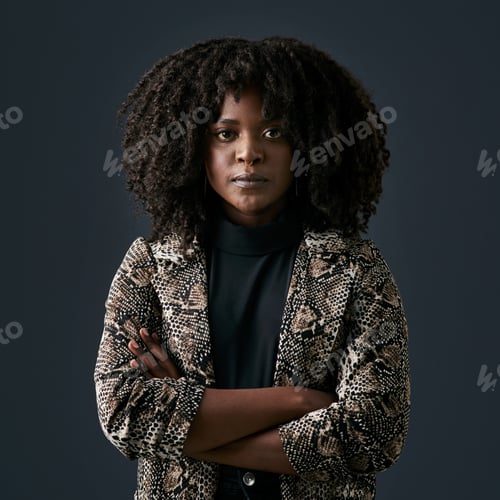 Preview: Im determined to be successful. Shot of a young businesswoman against a studio background.
