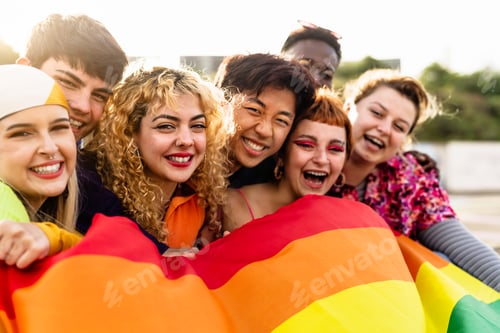 Preview: Diverse young friends celebrating gay pride festival - LGBTQ community concept