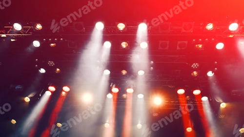 Preview: glowing ceiling spotlights lights the stage