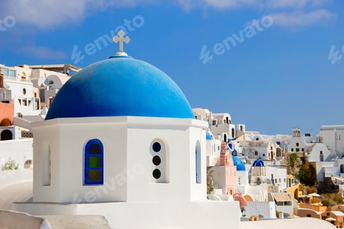 Preview: Closeup shot of Greek church of St. Nicholas with blue dome, Oia, Santorini Thira, Greece