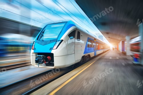 Preview: High speed train in motion on the railway station at sunset