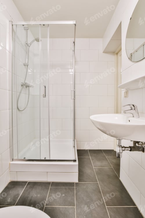 Preview: Stunning bathroom with black tiled floor