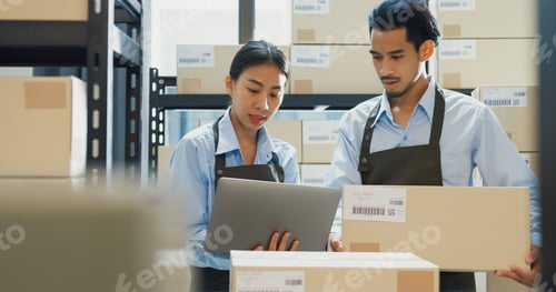Preview: Girl hold laptop and man wear formal shirt hold cardboard box training inventory online stock.