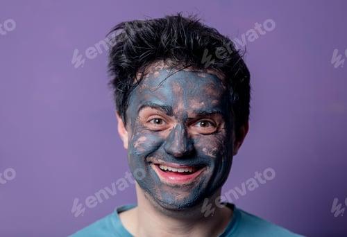Preview: smiling guy in a face care mask
