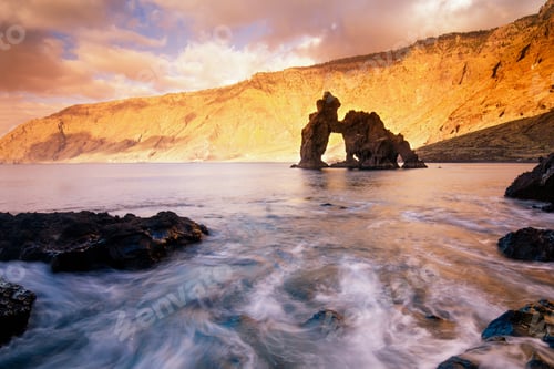 Preview: Amazing stone shore and pink sky with clouds