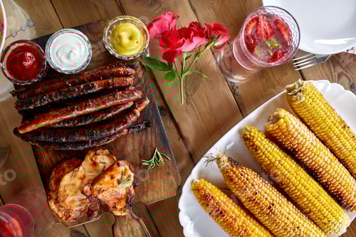 Preview: Dinner table appetizers variety serving on party outdoor table at home.