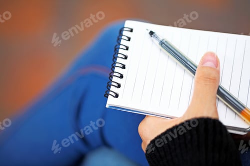 Preview: Notepad hold by hand
