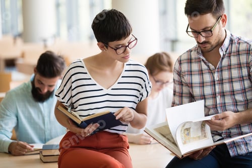 Preview: Young woman and man studying for an exam