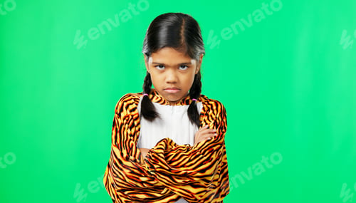 Preview: Girl child, angry face and green screen studio with arms crossed, refuse or shake head in tiger pyj