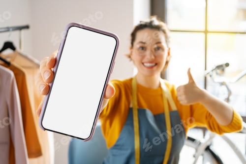 Preview: Woman is working at workshop