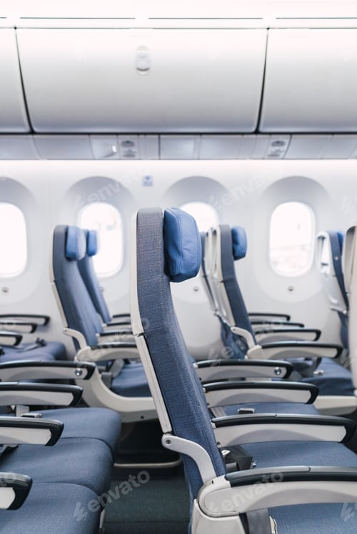Preview: Aisle in modern plane cabin