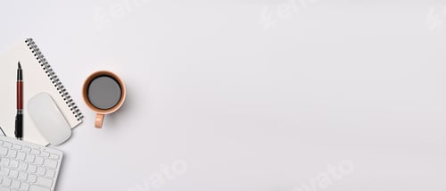 Preview: Above view minimal workspace with notebook, keyboard and coffee cup on white table.