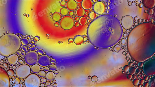 Preview: Abstract Colorful Food Oil Drops Bubbles and spheres Flowing on Water Surface