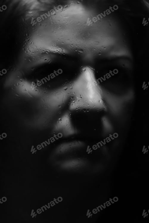 Preview: a close up of a person wearing a face painted with paint