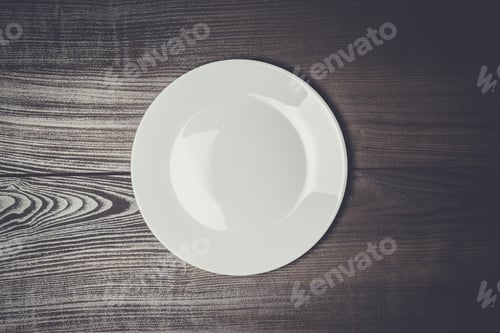 Preview: white plate on wooden brown table