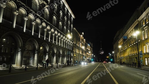 Preview: Night in the City with People on Sidewalks