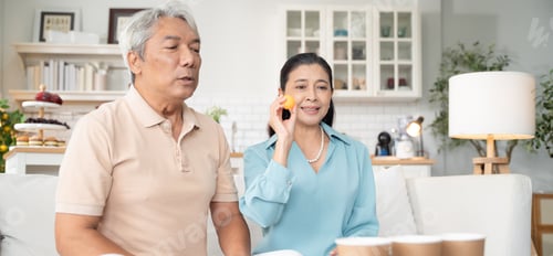 Preview: Couple Enjoying a Lighthearted Moment at Home